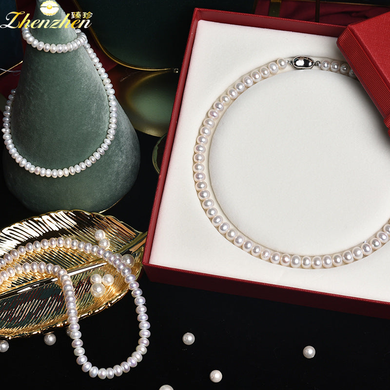 Wholesale genuine steamed buns round natural freshwater pearl necklace Mother's Day gift box for mothers and elders