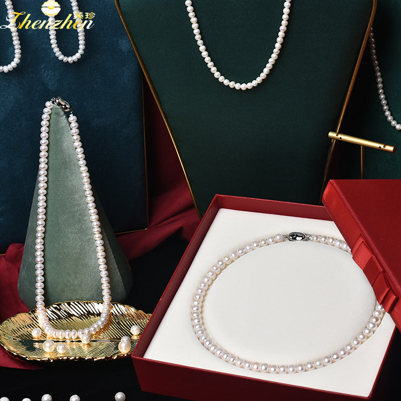Wholesale genuine steamed buns round natural freshwater pearl necklace Mother's Day gift box for mothers and elders