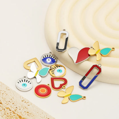 European American Style Stainless Steel Gold Plated Enamel Heart Eye Butterfly Charm Pendant for Jewelry Necklace Making