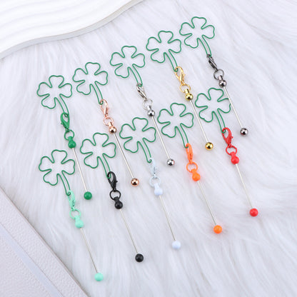 New four-leaf clover keychain, creative DIY beaded four-leaf clover shape keychain, backpack, luggage pendant in stock.