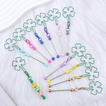 New four-leaf clover keychain, creative DIY beaded four-leaf clover shape keychain, backpack, luggage pendant in stock.